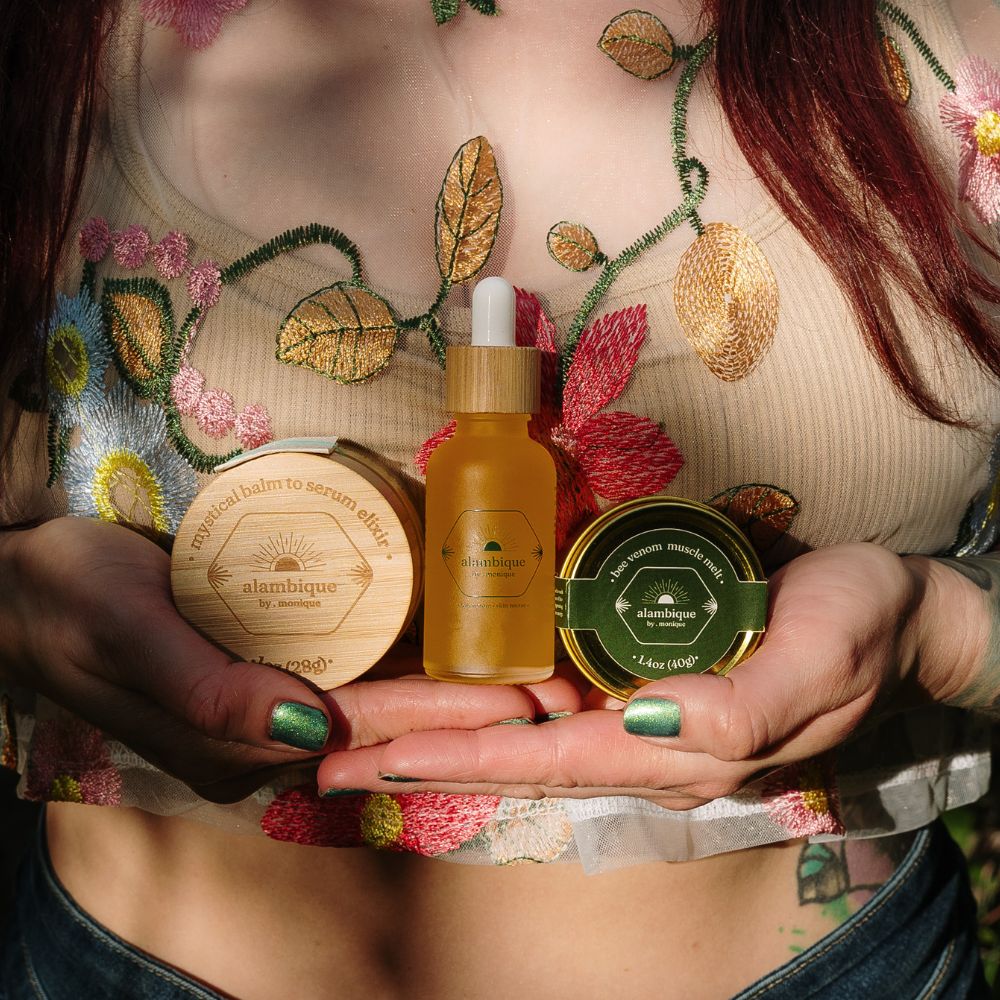 The best ethical bee venom set on the chest of a woman in a floral shirt